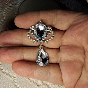 Sparkling Silvertone Teardrop Crystal Crown Brooch